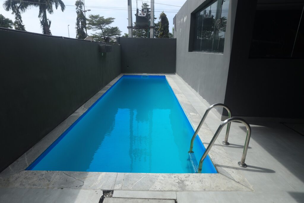 Brum Height 5: Narrow outdoor swimming pool beside the residential building
